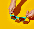 GIF flexing Ten Little Sunglasses - Teal. Available at www.tenlittle.com