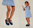 Split view of child jumping wearing Ten Little Velvet Ballet Flats - Sapphire Blue. Available from www.tenlittle.com
