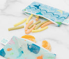 Bumkins Small Reusable Snack Bag 2 pack in Ocean Life & Whale Tail with food inside