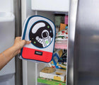 Person holding PackIt Freezable Playtime Lunch Box in space next to freezer. Available from www.tenlittle.com