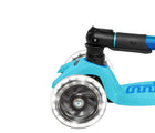 Close up of light-up wheel on Micro Kickboard Maxi Deluxe Foldable LED Scooter - Bright Blue. Available at www.tenlittle.com