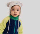 Child wearing Merino Wool Hat - Kuuru - Earthy Beige. Available at www.tenlittle.com