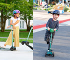 Girl and Boy Playing with Micro Kickboard Maxi Deluxe Eco Scooter - Green and Mint - Available at www.tenlittle.com