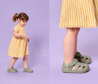 Split view of girl playing with bubbles and wearing Ten Little Splash Sandals 2 - Pebble Gray. Available at www.tenlittle.com