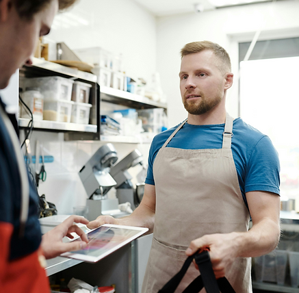 QSR kitchen staff preparing food as part of LineTen’s Direct Delivery workflow, supporting real-time fulfilment and dispatch