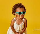 Girl age 2.5 wearing Ten Little Sunglasses size 2-4Y - Teal. Available at www.tenlittle.com
