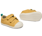 Side and bottom of shoe view of Ten Little Eco Canvas Sneakers - Mellow Yellow. Available at www.tenlittle.com